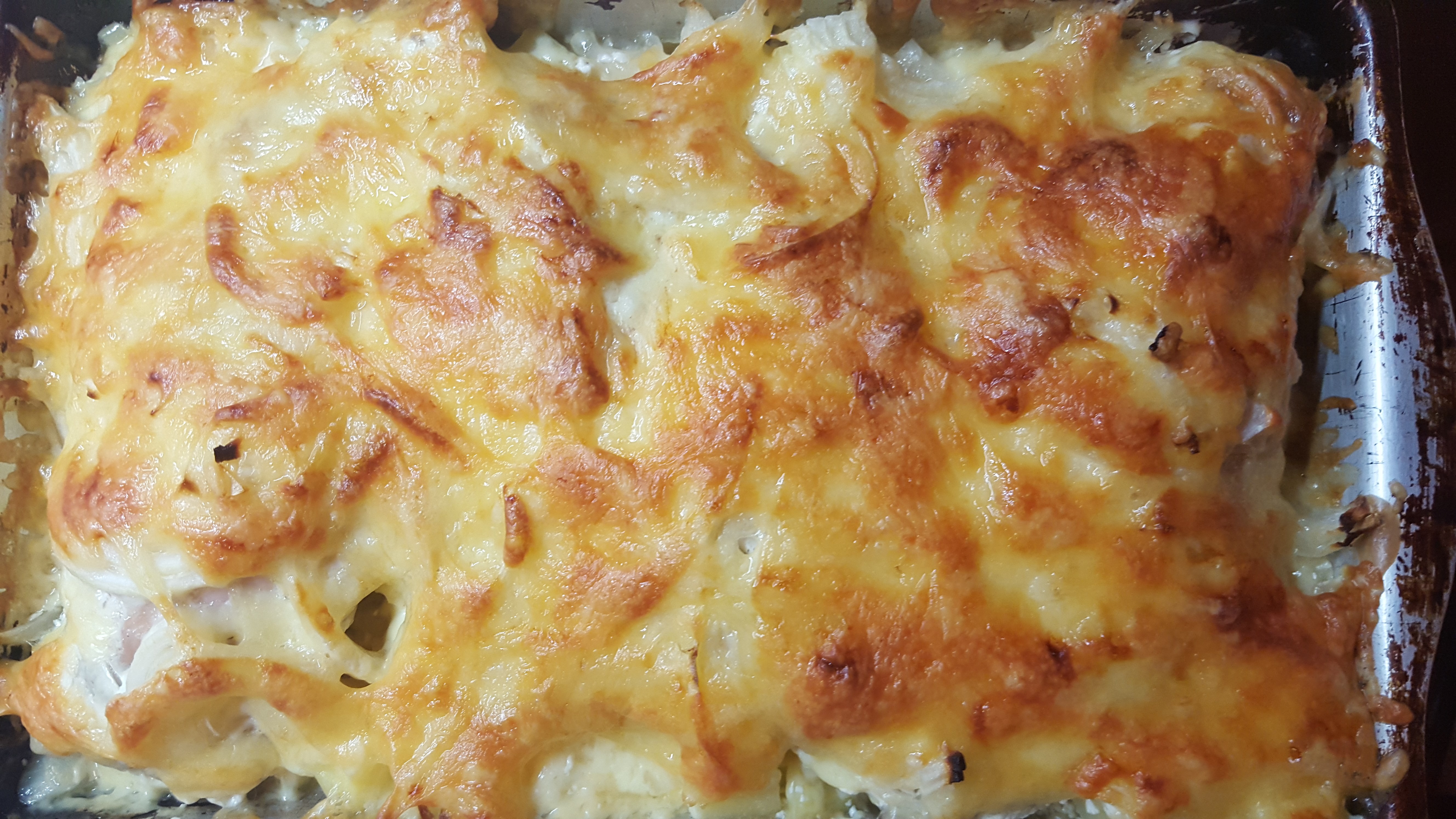 Кролик, запеченный со сметаной и сыром